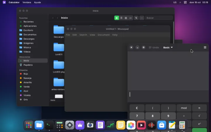 Un editor GTK 3 y una calculadora GTK 4 siguiendo el modo oscuro y el color de acento.