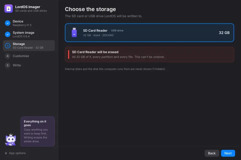 Step 3: the SD card, selected, with the erase warning
