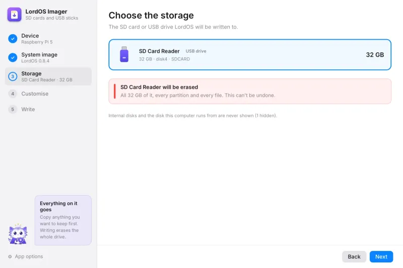 Step 3: the SD card, selected, with the erase warning
